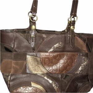 Coach brown leather mixed media patchwork handbag with gold hardware hang tag